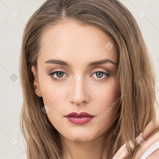 Neutral white young-adult female with long  brown hair and brown eyes