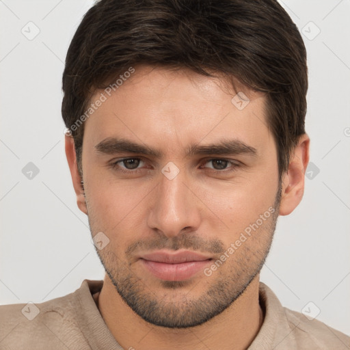 Neutral white young-adult male with short  brown hair and brown eyes