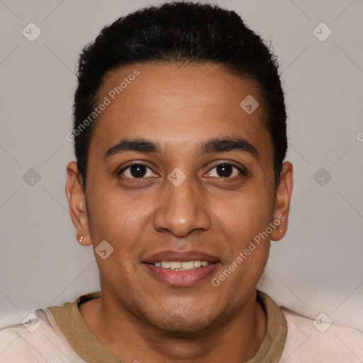 Joyful white young-adult male with short  black hair and brown eyes