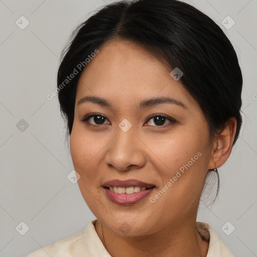 Joyful asian young-adult female with medium  brown hair and brown eyes