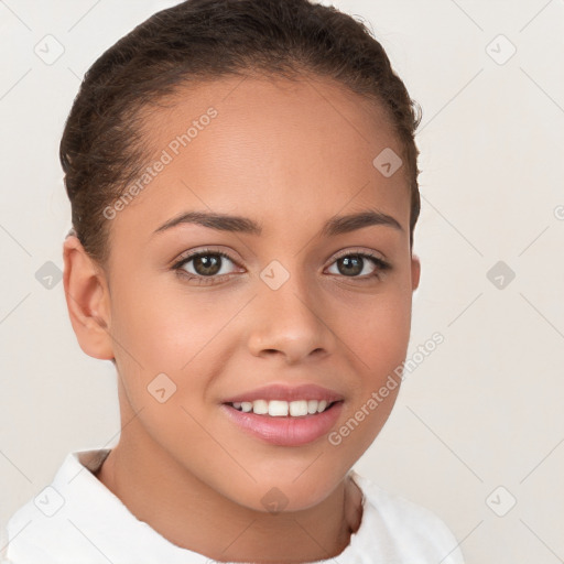 Joyful white child female with short  brown hair and brown eyes