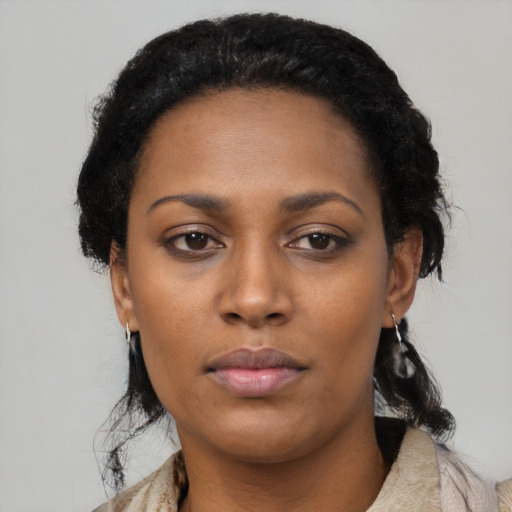 Neutral black young-adult female with medium  black hair and brown eyes