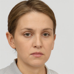 Neutral white young-adult female with short  brown hair and brown eyes