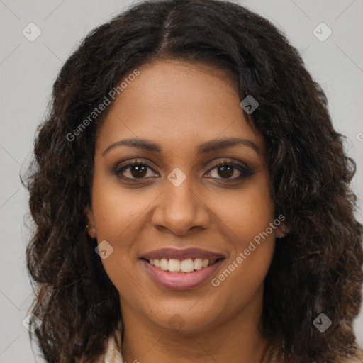 Joyful black young-adult female with long  brown hair and brown eyes