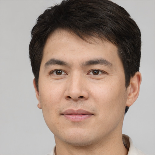Neutral white young-adult male with short  black hair and brown eyes