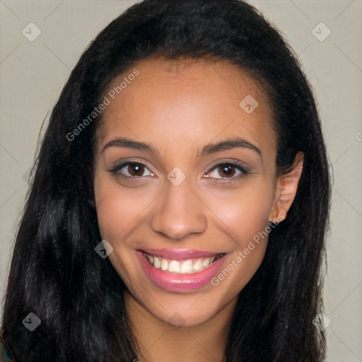 Joyful latino young-adult female with long  brown hair and brown eyes