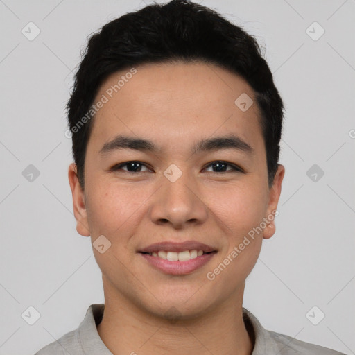 Joyful asian young-adult male with short  black hair and brown eyes