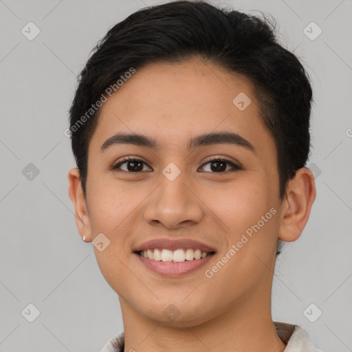 Joyful latino young-adult female with short  brown hair and brown eyes