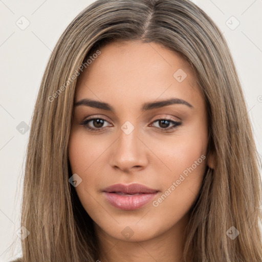 Neutral white young-adult female with long  brown hair and brown eyes