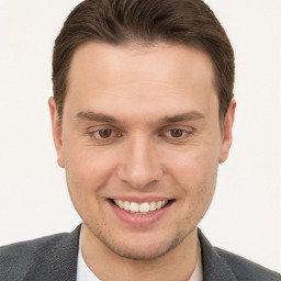 Joyful white young-adult male with short  brown hair and brown eyes