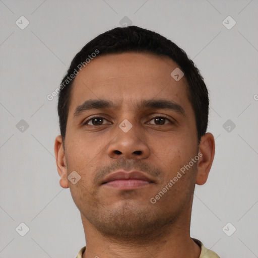 Neutral latino young-adult male with short  black hair and brown eyes