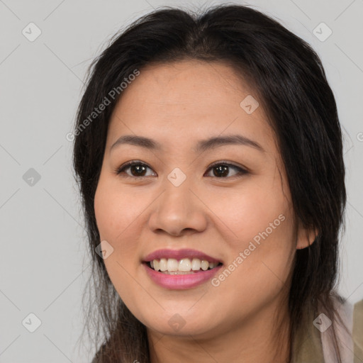 Joyful white young-adult female with long  brown hair and brown eyes