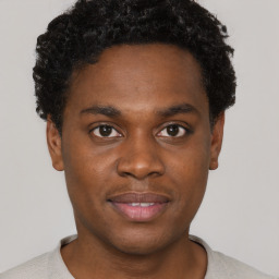 Neutral black young-adult male with short  brown hair and brown eyes