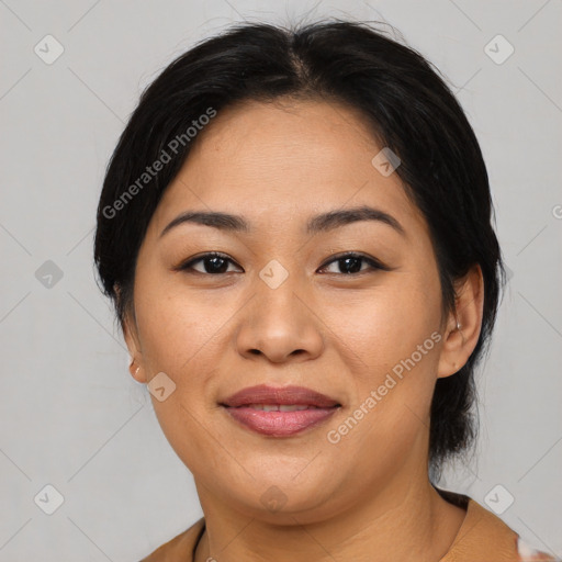 Joyful asian young-adult female with medium  brown hair and brown eyes