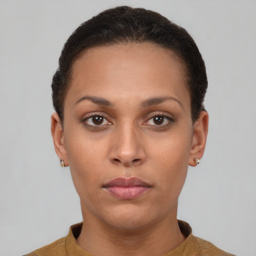 Neutral latino young-adult female with short  brown hair and brown eyes