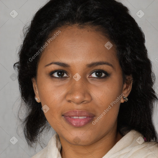 Joyful black adult female with medium  brown hair and brown eyes