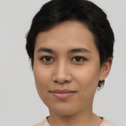 Joyful asian young-adult female with short  brown hair and brown eyes