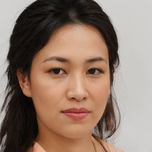 Neutral asian young-adult female with medium  brown hair and brown eyes