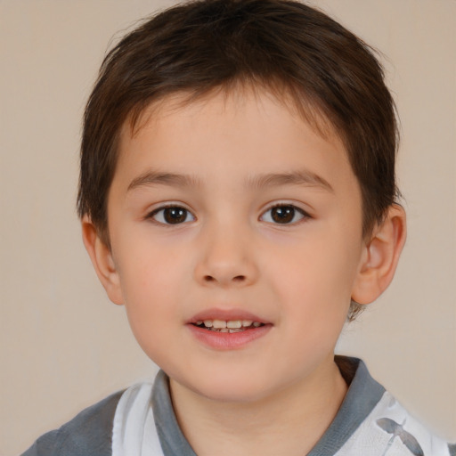 Joyful white child male with short  brown hair and brown eyes