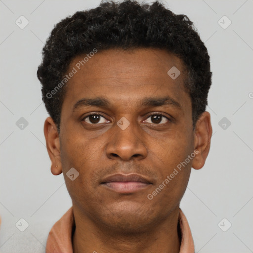 Neutral black young-adult male with short  brown hair and brown eyes