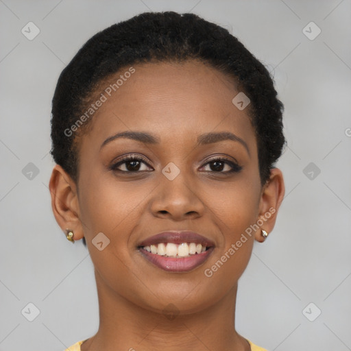 Joyful black young-adult female with short  brown hair and brown eyes