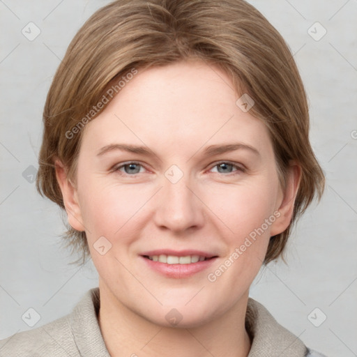 Joyful white young-adult female with medium  brown hair and blue eyes