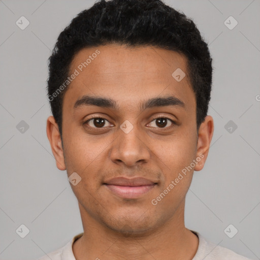 Joyful latino young-adult male with short  brown hair and brown eyes