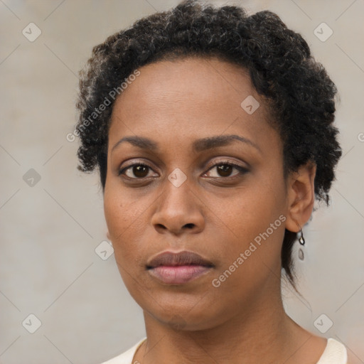 Neutral black young-adult female with short  black hair and brown eyes