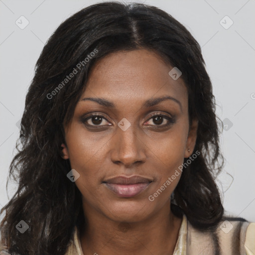 Joyful black young-adult female with long  brown hair and brown eyes