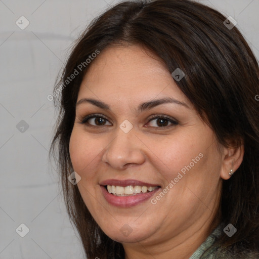 Joyful white adult female with medium  brown hair and brown eyes