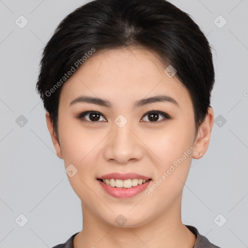 Joyful asian young-adult female with short  brown hair and brown eyes