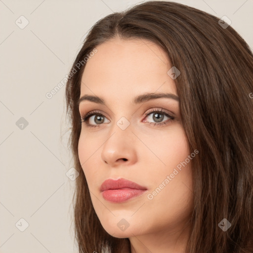 Neutral white young-adult female with long  brown hair and brown eyes