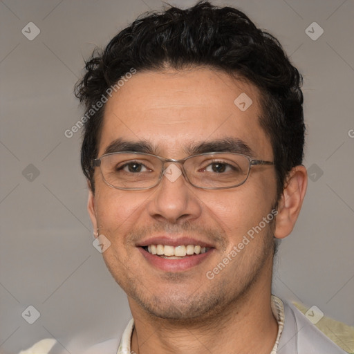 Joyful white adult male with short  black hair and brown eyes