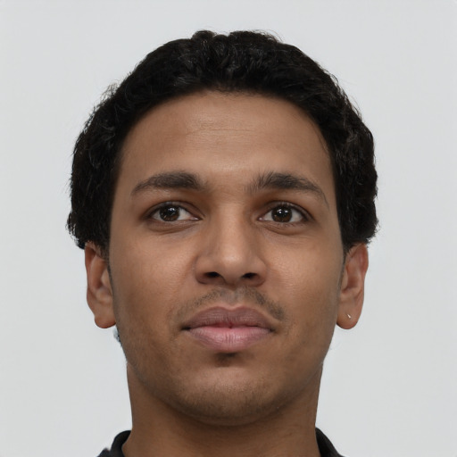 Neutral latino young-adult male with short  brown hair and brown eyes