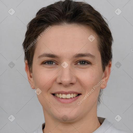 Joyful white young-adult female with short  brown hair and brown eyes