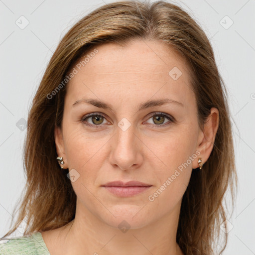 Joyful white young-adult female with medium  brown hair and green eyes