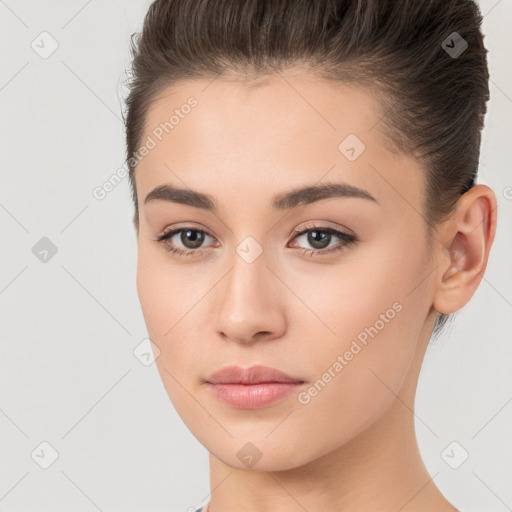 Neutral white young-adult female with short  brown hair and brown eyes