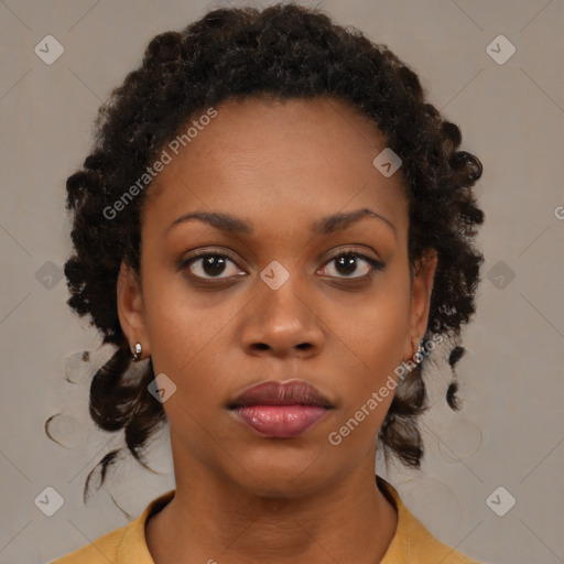 Neutral black young-adult female with medium  brown hair and brown eyes