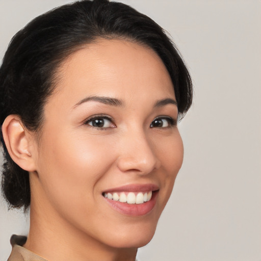 Joyful white young-adult female with medium  brown hair and brown eyes