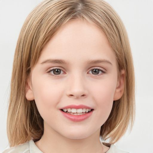 Joyful white child female with medium  brown hair and grey eyes