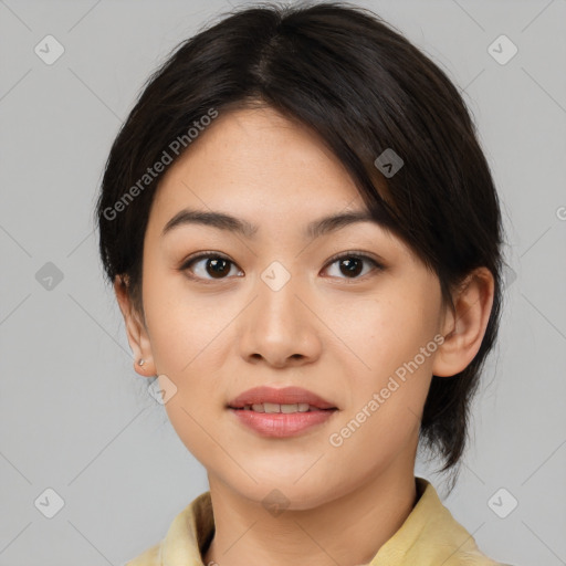Joyful asian young-adult female with medium  brown hair and brown eyes