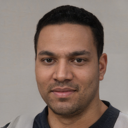 Neutral white young-adult male with short  black hair and brown eyes