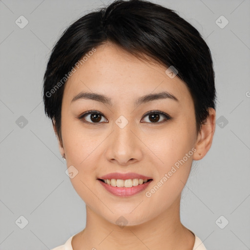 Joyful asian young-adult female with medium  brown hair and brown eyes