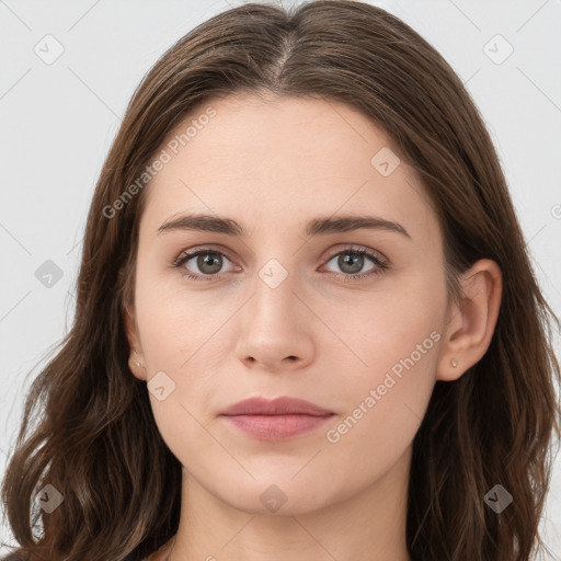 Neutral white young-adult female with long  brown hair and grey eyes