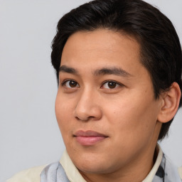 Joyful white young-adult male with medium  brown hair and brown eyes