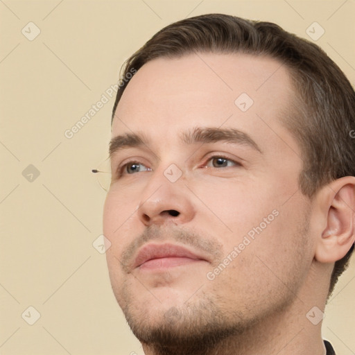 Neutral white young-adult male with short  brown hair and brown eyes