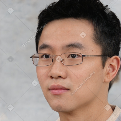 Neutral asian young-adult male with short  black hair and brown eyes