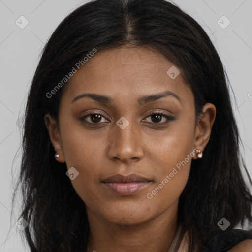 Neutral black young-adult female with long  brown hair and brown eyes