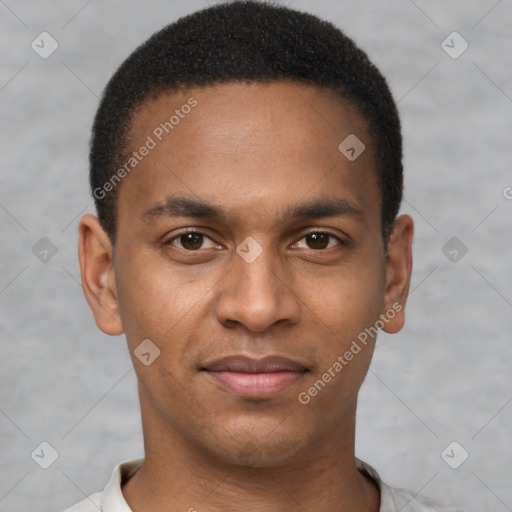 Joyful latino young-adult male with short  brown hair and brown eyes