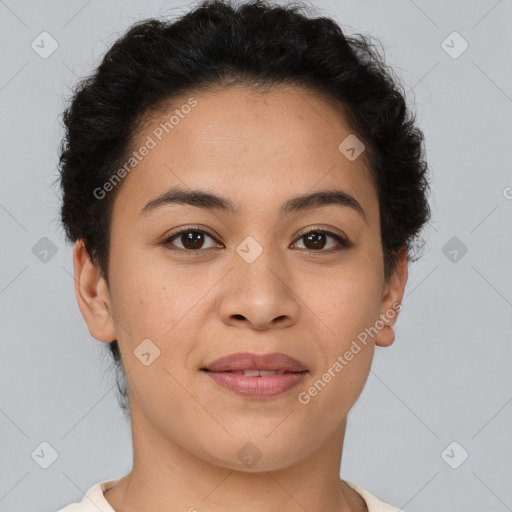 Joyful latino young-adult female with short  brown hair and brown eyes